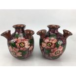 Pair of Longpark five neck udder vases, on purple ground with floral decoration, incised 39, each