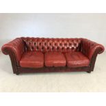 Vintage red leather three seater button-back chesterfield sofa, approx 195cm in length