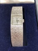 Rotary ladies Silver coloured watch with square face and numbered 212 to reverse in original box