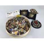 Large quantity of badges and pins