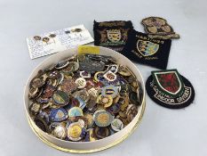 Large quantity of badges and pins