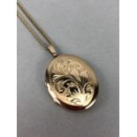 9ct Oval Gold locket and chain (approx 9.6g)