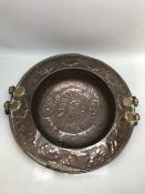 Large embossed copper bowl with heavy brass handles, diameter approx 53cm