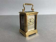 Miniature carriage clock, approx 17cm tall, with key