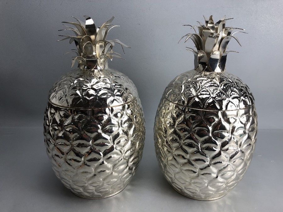 Pair of large silver plated ice buckets in the form of pineapples. With hinged lids. Approx. 35cm