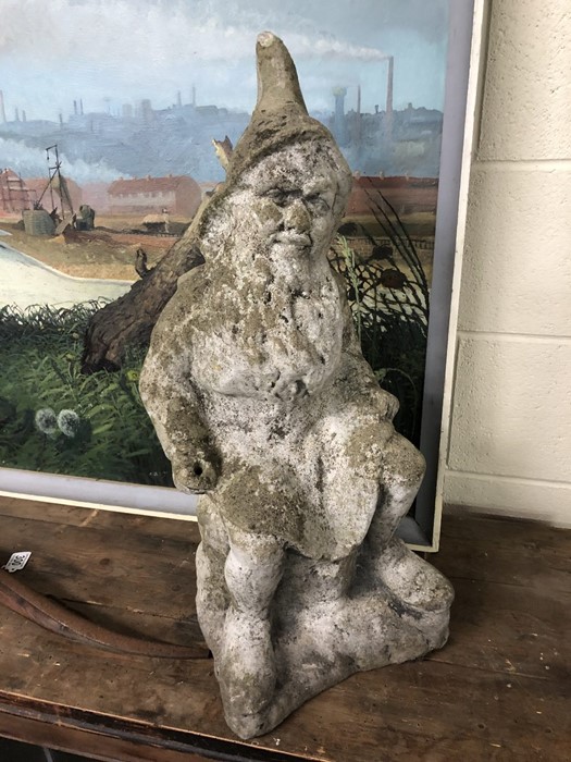 Seated stone garden gnome