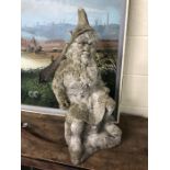 Seated stone garden gnome