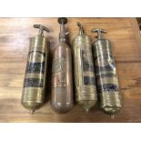 Four vintage brass and copper fire extinguishers