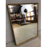 Large bevel edged mirror with gold effect frame, approx 105cm x 80cm