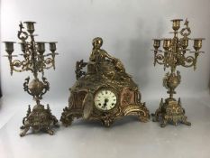 German Imperial Brass mantle clock with Candelabra Garnitures and ceramic inserts (A/F)