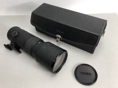 A Sigma APO AF Tele Lens 1:7.2 Multi coated with foot in case
