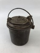Cast iron warmer, small bucket with handle and inner lidded cast iron warming pot, approx 8cm tall