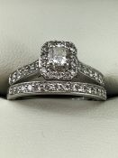 Diamond and Platinum Engagement and Wedding ring set. The Bridal set consists of a single Diamond
