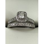 Diamond and Platinum Engagement and Wedding ring set. The Bridal set consists of a single Diamond