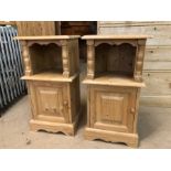 Pair of pine bedsides with shelf and cupboard under