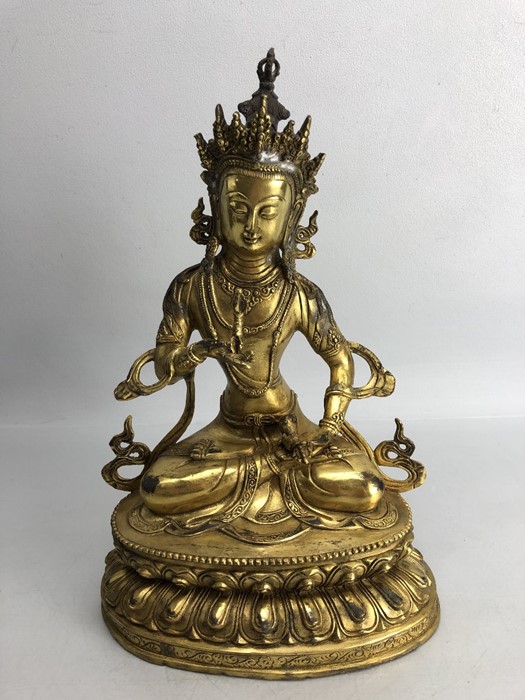 Large gilt bronze of a Chinese Buddha, approx 32cm in height