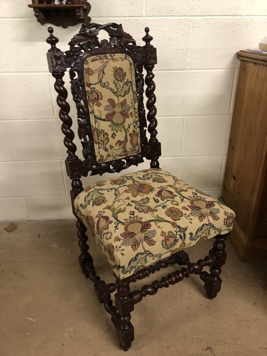 Single oak framed heavily carved upholstered chair with barley twist frame