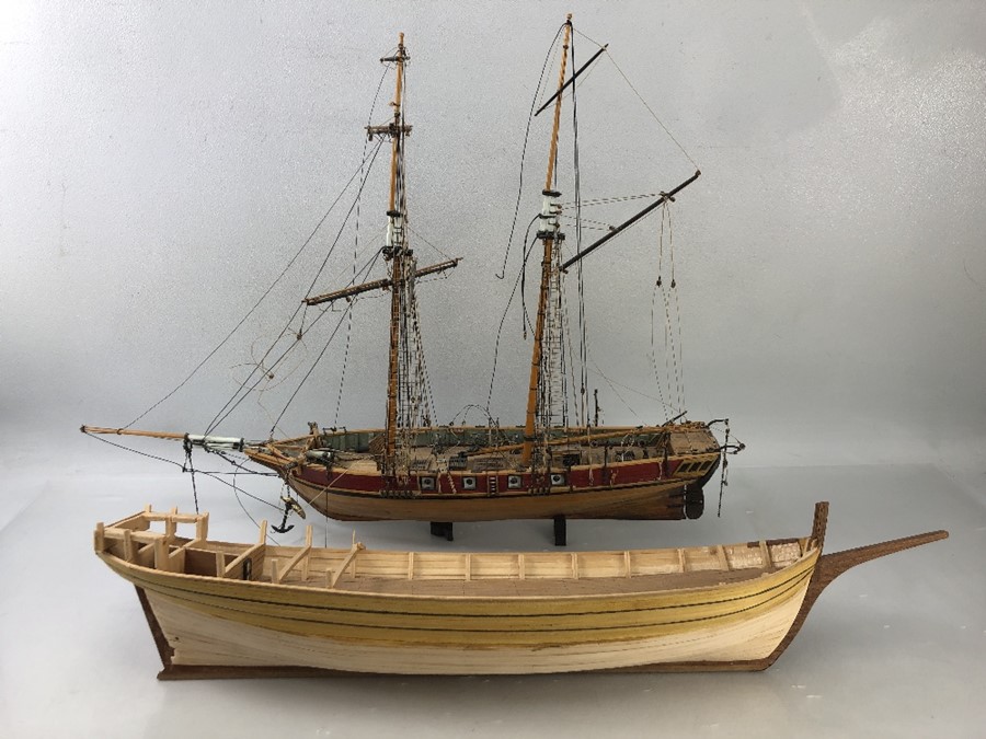 Two wooden model boats, the large approx 62cm long, both (A/F)