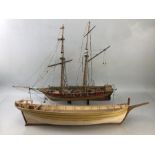 Two wooden model boats, the large approx 62cm long, both (A/F)