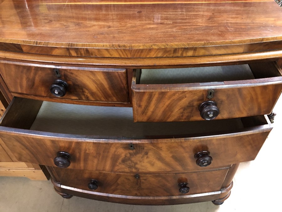 Bow fronted chest of five drawers with ebonised handles on turned feet approx 116cm x 55cm x 123cm - Image 3 of 5