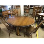 Ercol drop leaf /gate leg dining table, approx 140cm x 128cm extended, with four stick back Ercol