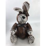 Ornamental doorstop in the form of a rabbit, approx 40 cm tall