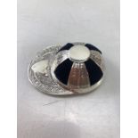 Silver pin cushion in the shape of a jockeys hat.