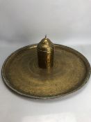 Large circular Eastern brass tray, approx 58cm in diameter, with a brass tea caddy depicting