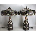 Pair of Tiffany style large table lamps in multi-coloured design, each approx 60 cm in height