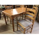 Pine kitchen/dining table, approx 150cm x 77cm, with four matching chairs