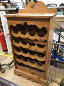 Pine free-standing wine rack to hold 20 bottles, approx 61cm x 37cm x 120cm tall