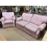 Two-seater sofa and single armchair upholstered in 'ticking' style pink striped fabric