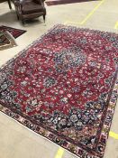 Old red ground Iranian carpet, Mashhad region, approx 270cm x 185cm