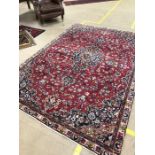 Old red ground Iranian carpet, Mashhad region, approx 270cm x 185cm