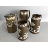 Collection of four Wedgewood Brown and white Jasperware jugs with rope effect handles