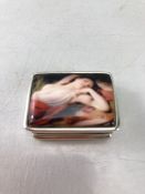 Small rectangular silver pill box with recumbent lady to lid. Stamped 925