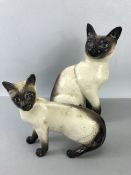 Beswick Siamese cat, 1882, approx 24cm in height, and a further Beswick Siamese cat, approx 15cm