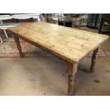 Pine kitchen farmhouse table on turned legs, approx 183cm x 90cm x 79cm tall