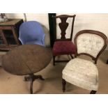 Three chairs to include a Victorian balloon-back, an original Lloyd Loom with label to underside