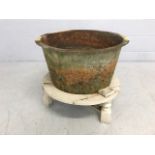 Metal butcher's boiling pot on wooden stand, approx diameter 60cm, height 55cm