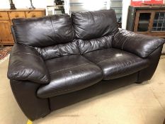 Two seater brown leather sofa