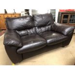 Two seater brown leather sofa