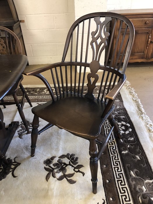 Dining table (possibly Ercol), approx 185cm in length, with six wheel back chairs and two carvers - Image 4 of 5