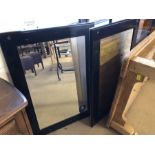 Pair of large black-framed bevel edged professional hairdressing mirrors, approx 107cm x 78cm each