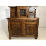 Sideboard / buffet with cupboard and two drawers under and central cupboard over with glazed door by