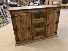 Mexican pine sideboard with two cupboards and three drawers, approx 125cms x 52cms x 87cms tall