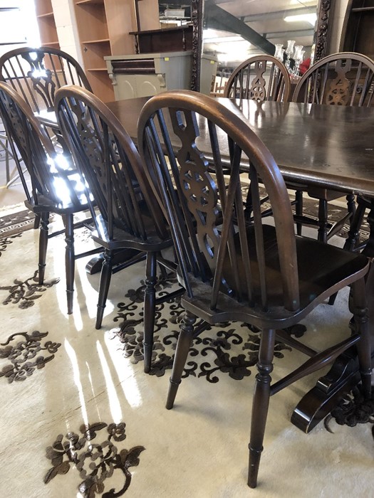 Dining table (possibly Ercol), approx 185cm in length, with six wheel back chairs and two carvers - Image 3 of 5