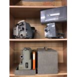 Collection of three vintage projectors, Hanimex Zoom, Ricoh Auto BP Trioscope and a Eumig P8 Movie