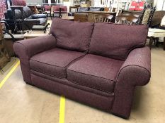 Purple upholstered two seater sofa