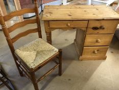 Small pine desk with four drawers, approx 102cm x 54cm x 74cm tall, and rush-seated chair